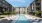 a pool in front of a building
