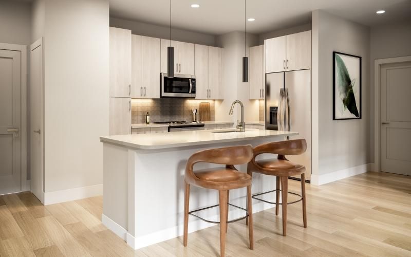 a kitchen with bar stools